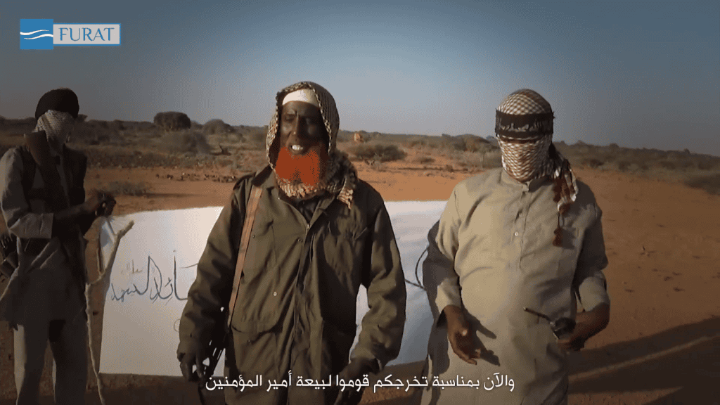 Abdulqadr Mumim, center, with red beard. Image from an Islamic State video showing a training camp in Somalia.