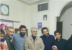 Photo 3. Soleimani meeting with family of Iranian commander in Fatemiyoun Division.