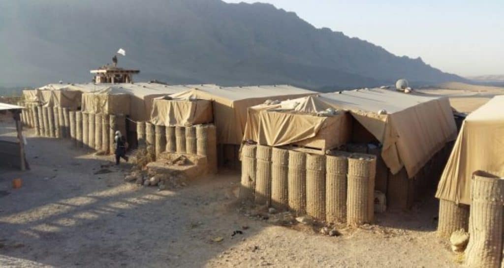 The Taliban flag flies over the "Khushdeer" base in Chora district, Uruzgan province, Afghanistan. Image from Voice of Jihad. 