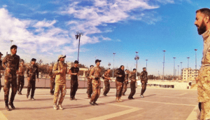 Photo 11. Dir Wilayat Brigades holding training exercises in Hamdaniyah Stadium near Aleppo, according to social media post.