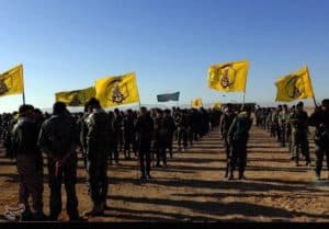 Photo 1. Afghan Fatemiyoun Division forces near Palmyra. Credit: Tasnim News. 