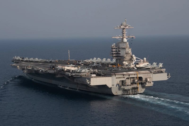 US deploys carrier, issues airspace warning, seizes oil tanker in latest Caribbean escalations