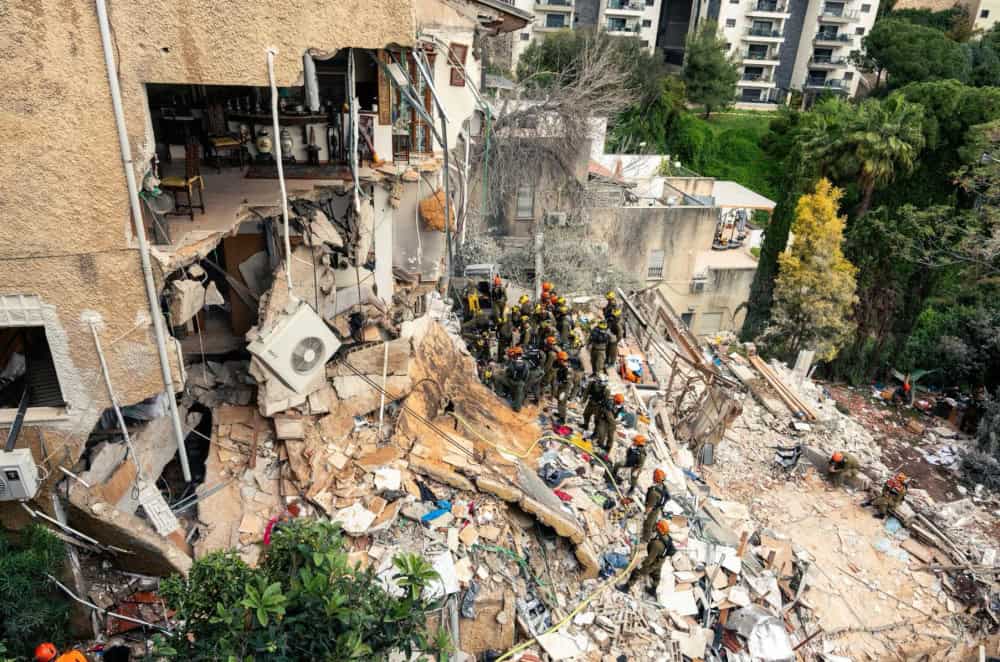 Iranian ballistic missile cluster munitions strike dozens of sites in Israeli cities